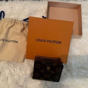 Pre-loved Louis Vuitton bi-fold wallet